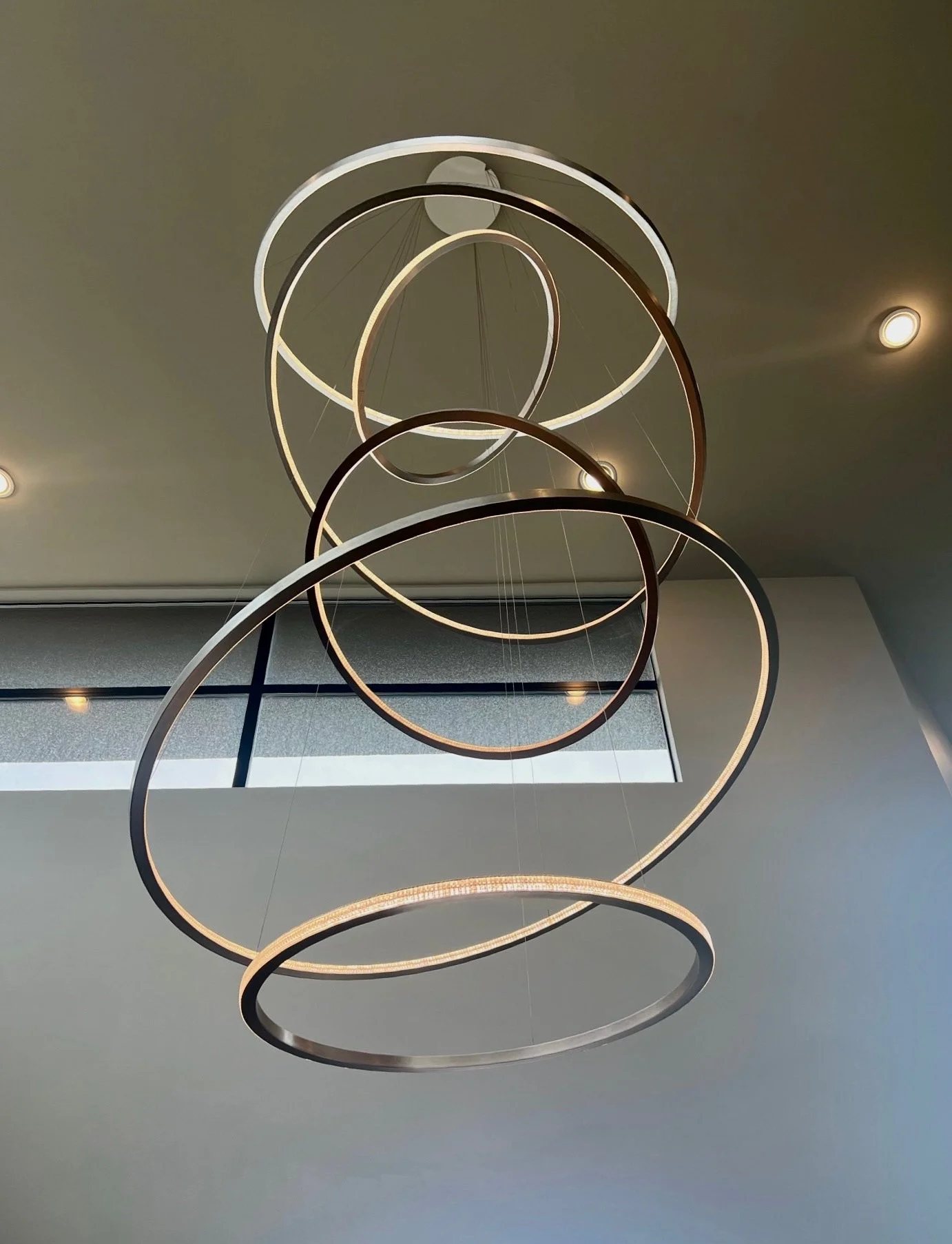 Dragon Residence entertainment space with sculptural lighting